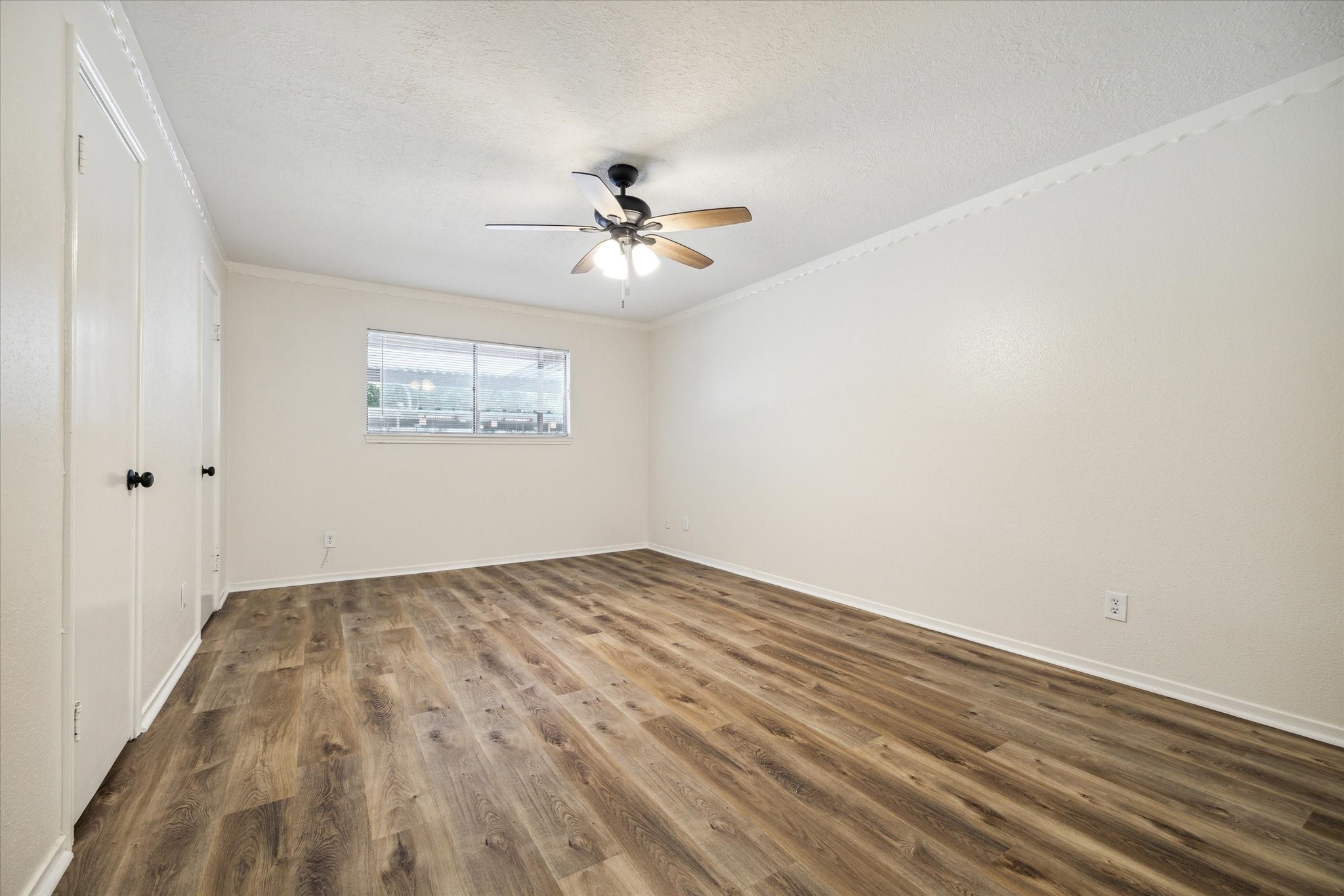 11540 Chimney Rock Road, Unit 128 Houston, TX 77035 - Photo 8 of 14 a view of empty room with window