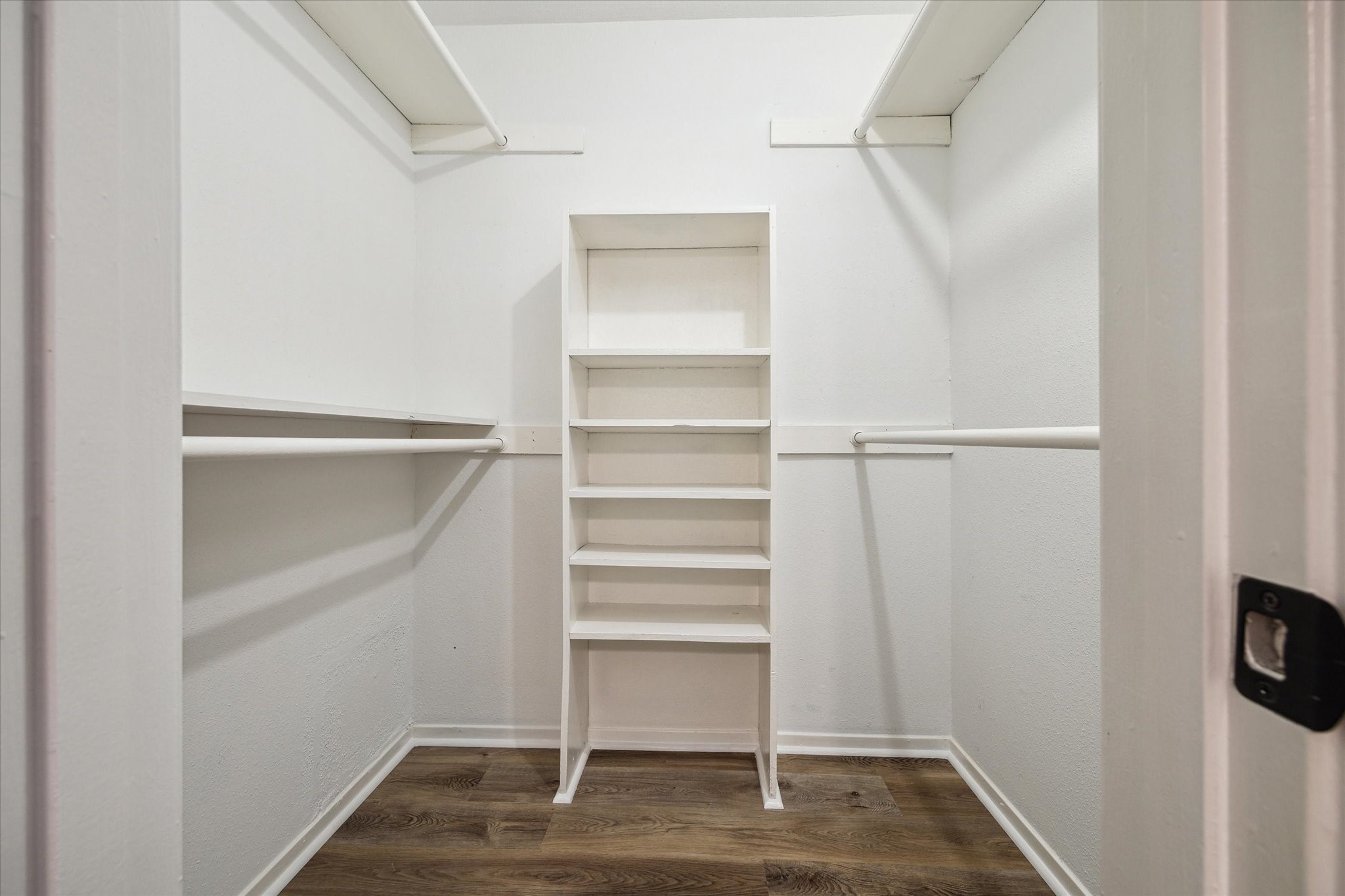 11540 Chimney Rock Road, Unit 128 Houston, TX 77035 - Photo 10 of 14 a view of walk in closet with empty racks