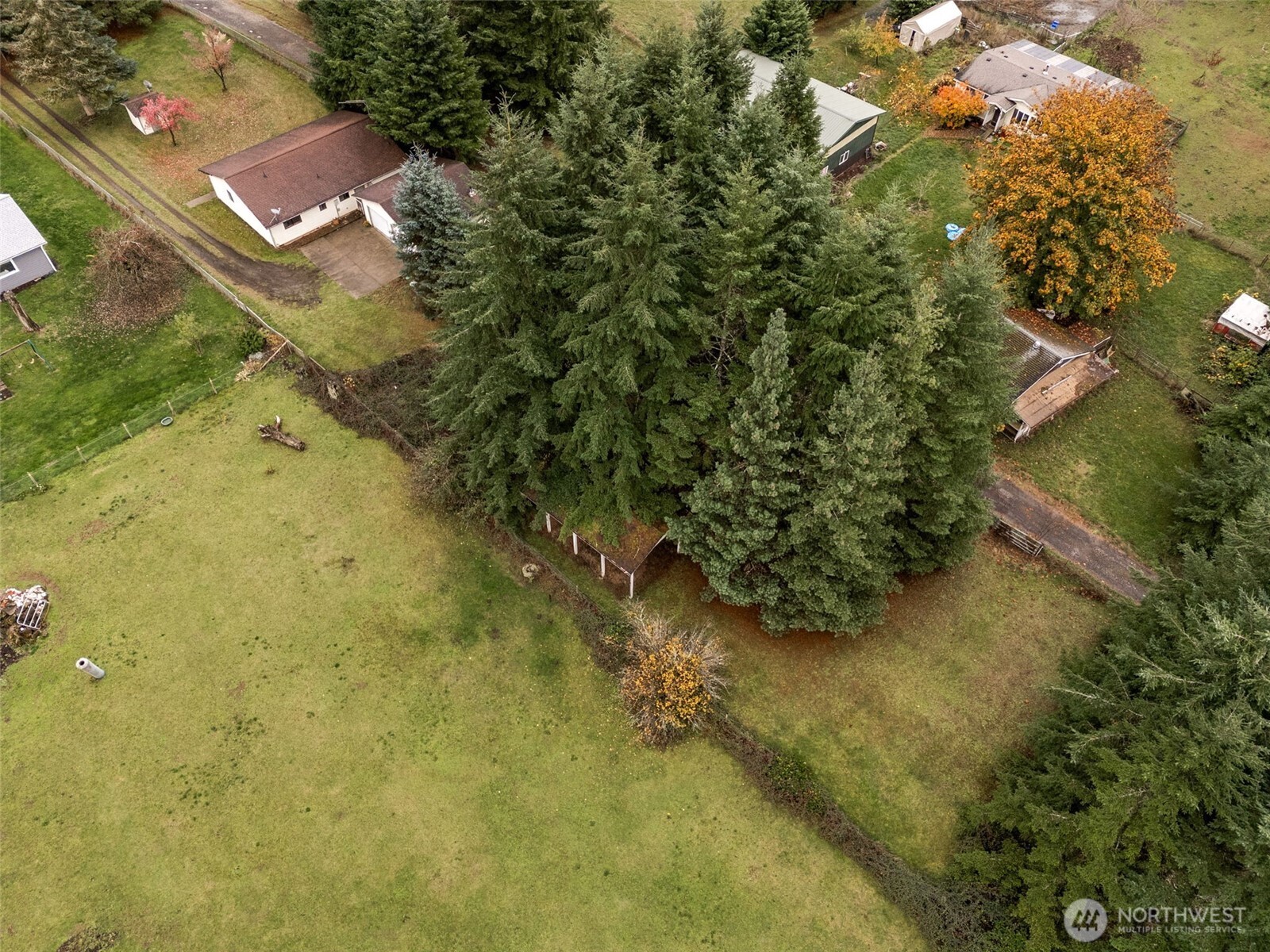 954 South Military Road Winlock, WA 98596 - Photo 3 of 39 an aerial view of residential house with an outdoor space and seating area