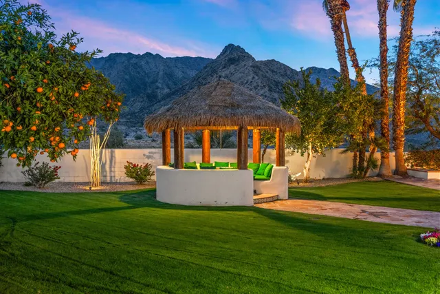 a house view with a garden space