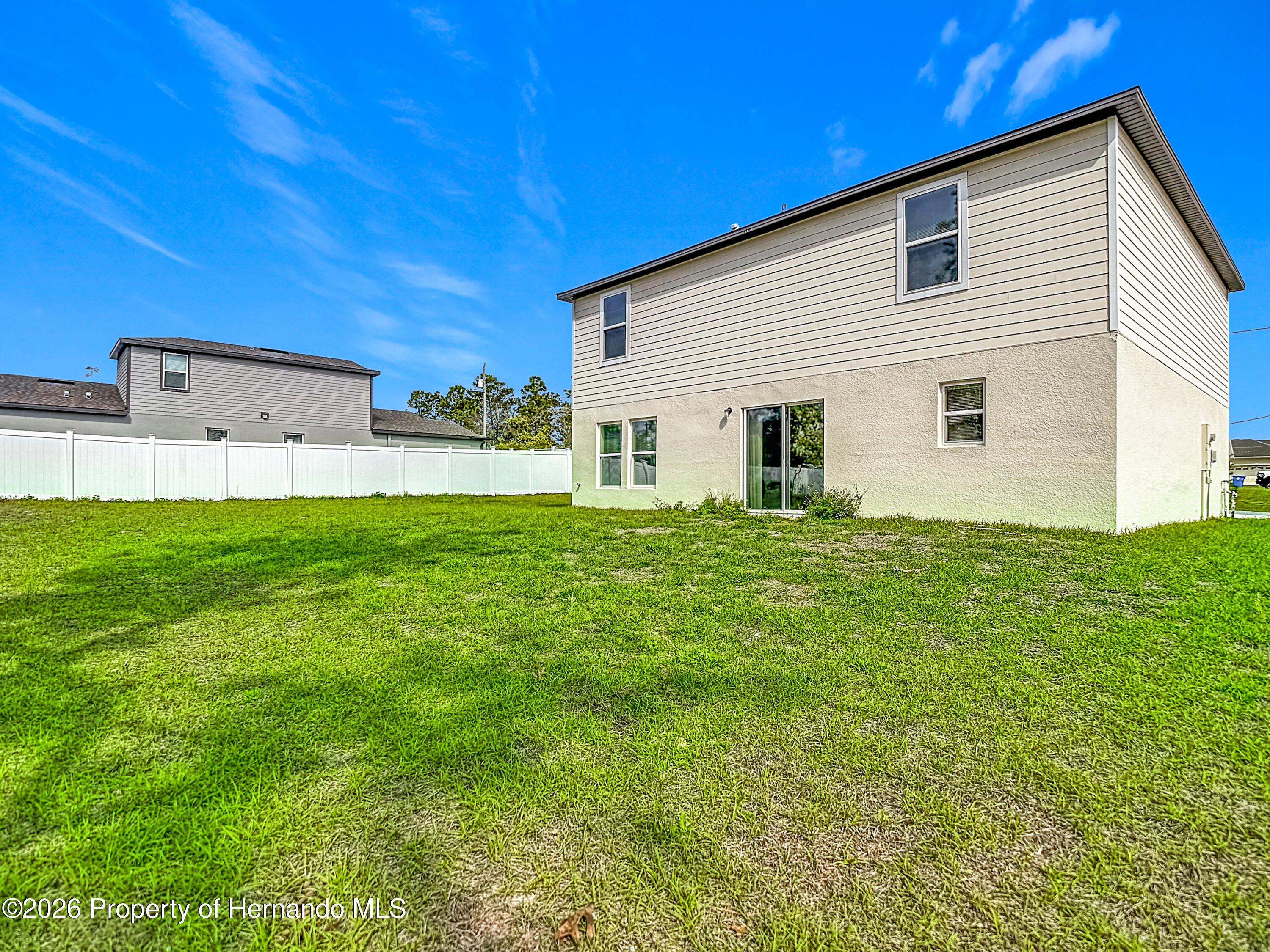 11374 Marcella Avenue Weeki Wachee, FL 34614 - Photo 62 of 70 a house view with a outdoor space