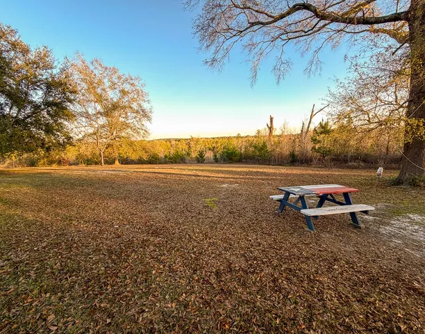 a view of a lake with outdoor space