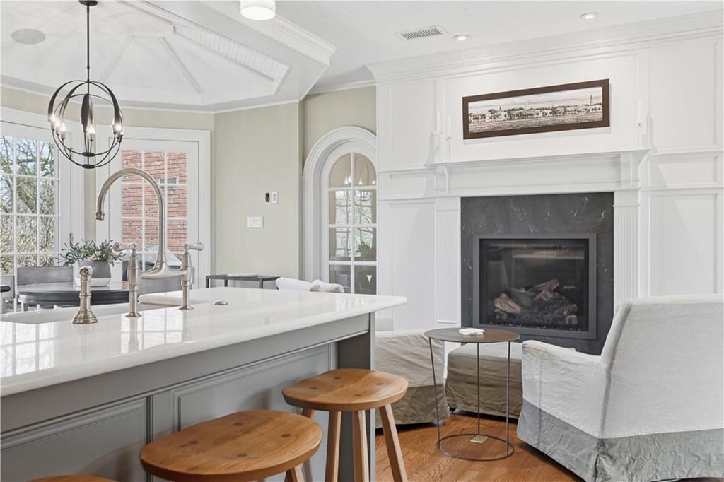 600 Backbone Road Sewickley, PA 15143 - Photo 21 of 50 A gas fireplace and seating area add warmth and livability to the kitchen. It is the kind of space where everyone naturally wants to gather.