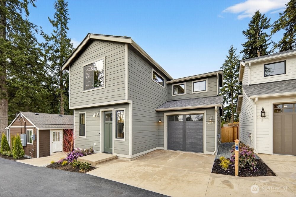 20701 82nd Avenue West Edmonds, WA 98026 - Photo 5 of 11 a front view of a house with a garage