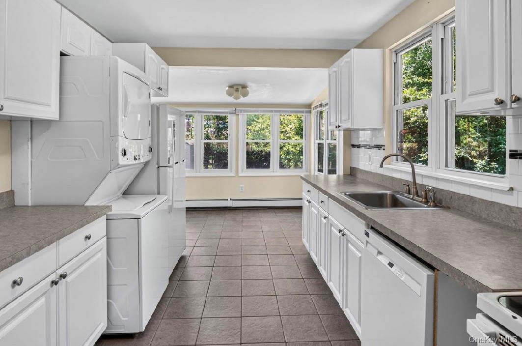 62 Shell Road Rocky Point, NY 11778 - Photo 5 of 22 Kitchen featuring stackable W/D.