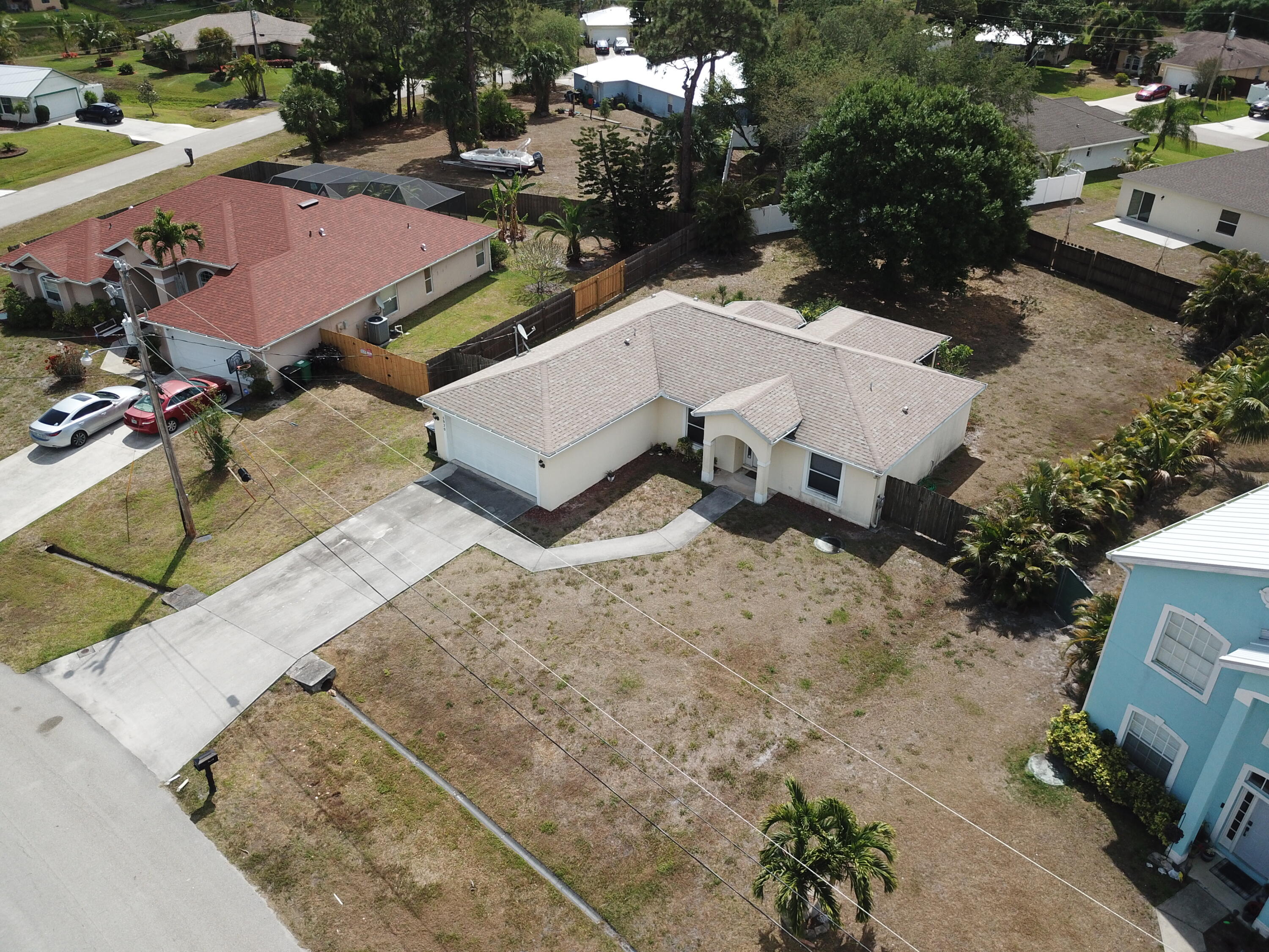 5920 Northwest Wolverine Road Port St. Lucie, FL 34986 - Photo 2 of 39 2C3C852EFAF88AC08AB1B1B303792250