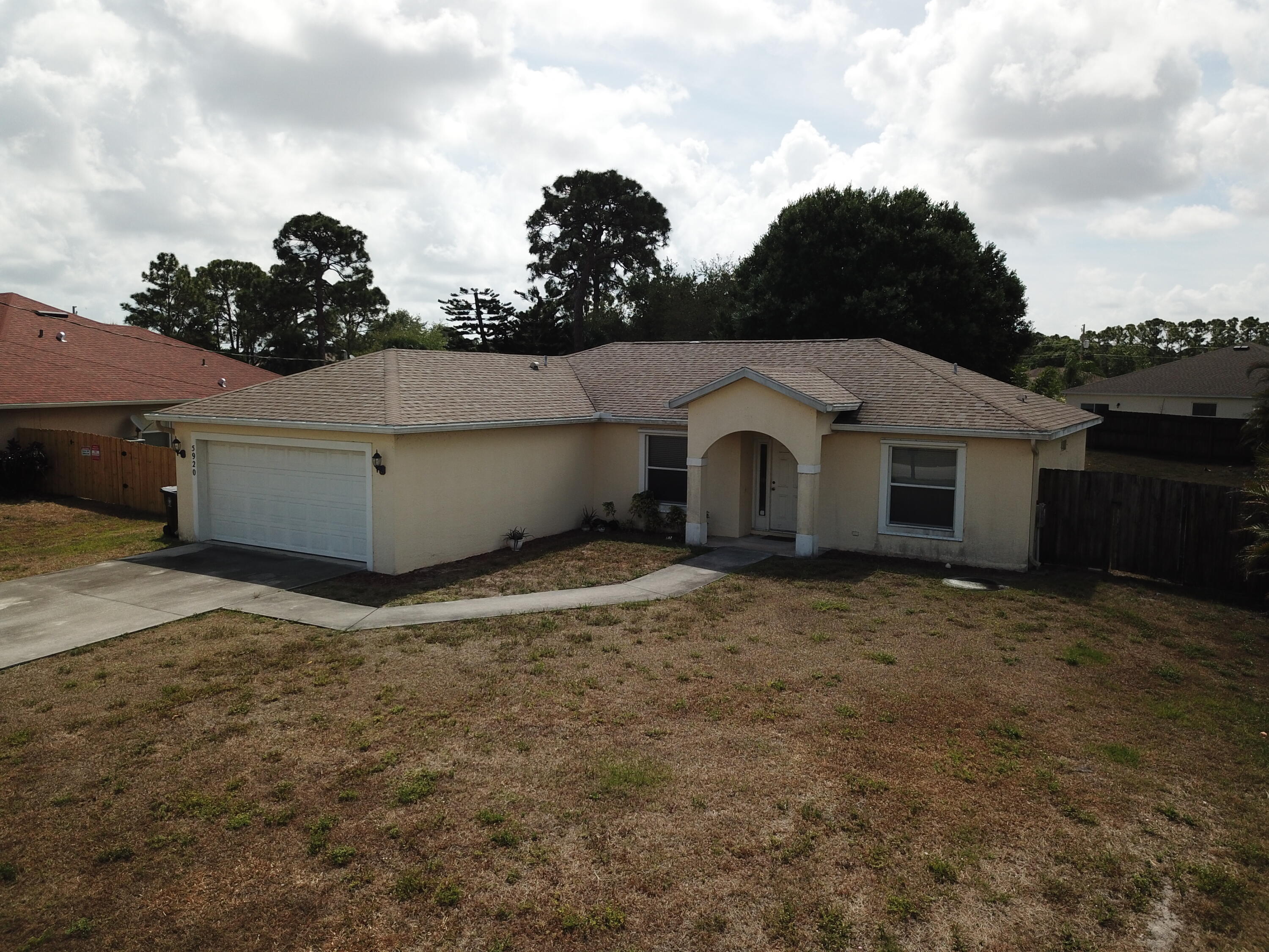 5920 Northwest Wolverine Road Port St. Lucie, FL 34986 - Photo 5 of 39 6252BCDCA7CB5AA21C1A27A3F3510727