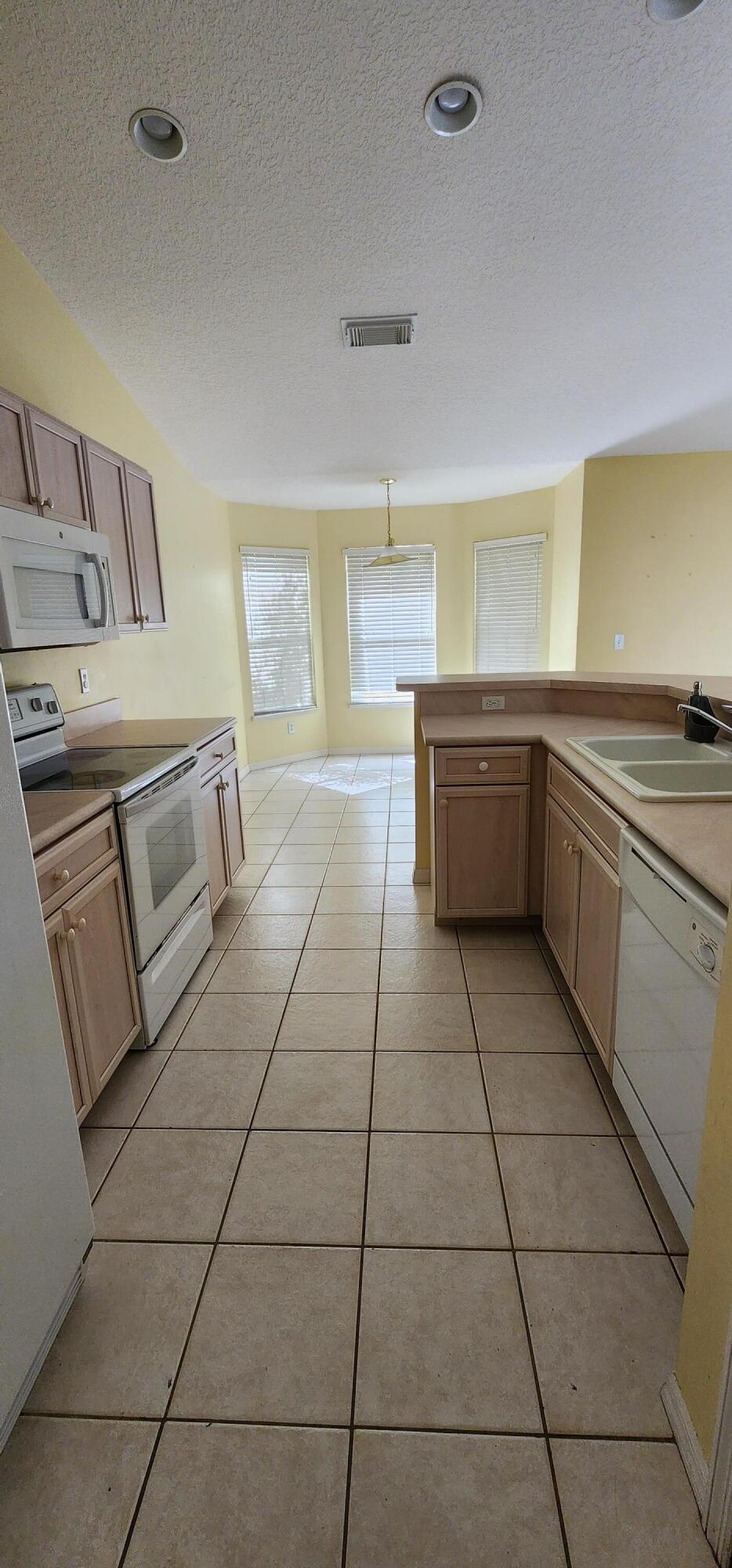 5920 Northwest Wolverine Road Port St. Lucie, FL 34986 - Photo 9 of 39 20230407_110738