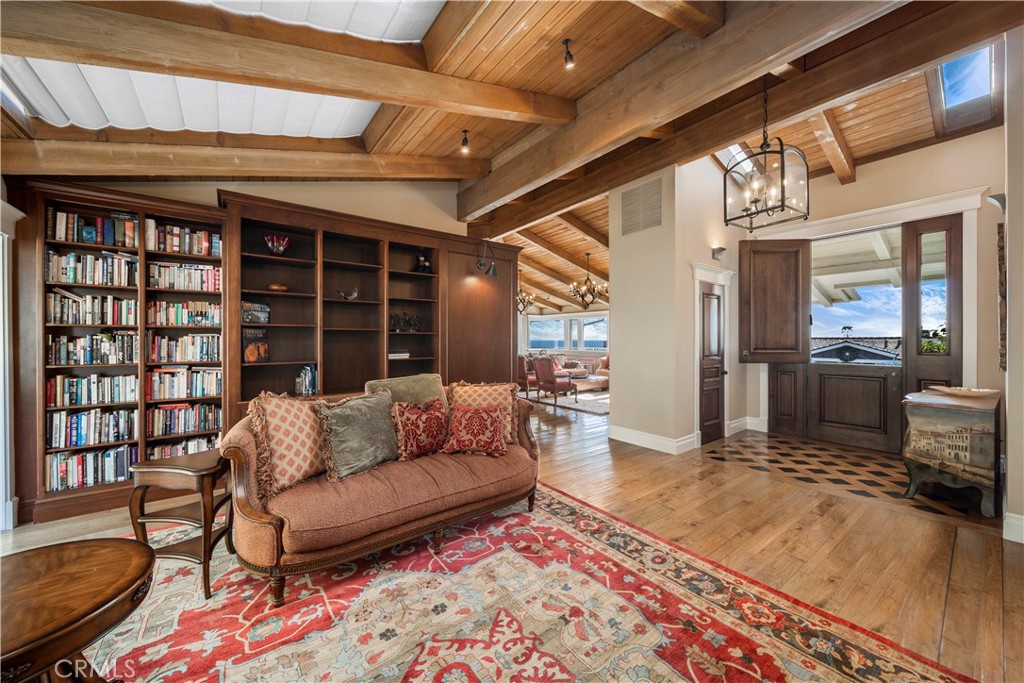 822 Emerald Bay Laguna Beach, CA 92651 - Photo 13 of 26 a living room with furniture and a rug