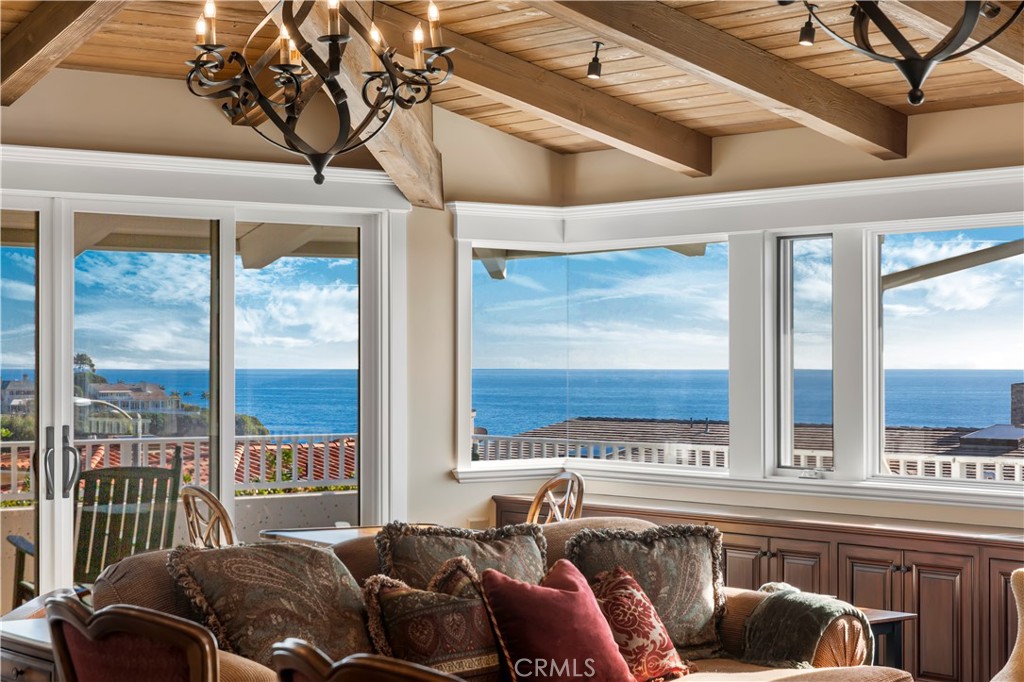 822 Emerald Bay Laguna Beach, CA 92651 - Photo 2 of 26 a living room with furniture and a large window