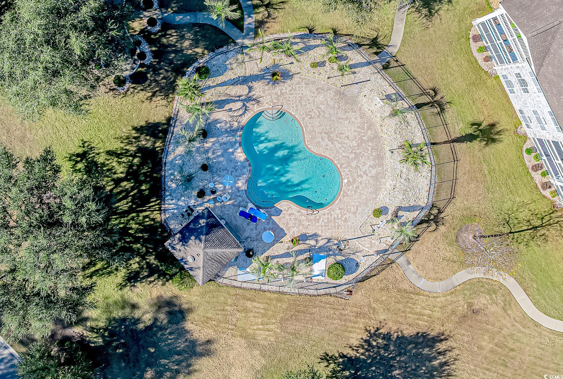 4647 Wild Iris Drive, Unit 303 Myrtle Beach, SC 29577 - Photo 25 of 29 Bird's eye view of a pool area