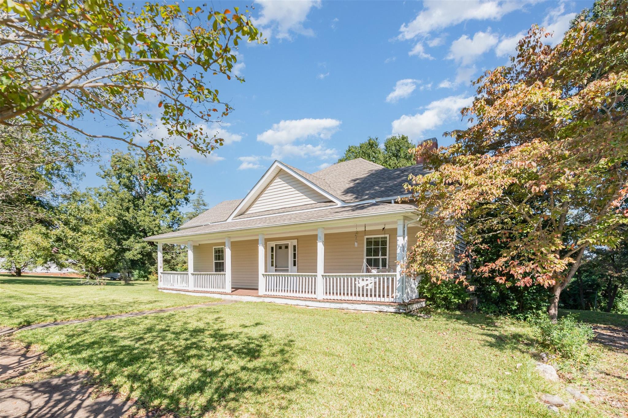 4030 Peachtree Street Hickory Grove, SC 29717 - Photo 1 of 21 a front view of a house with a garden