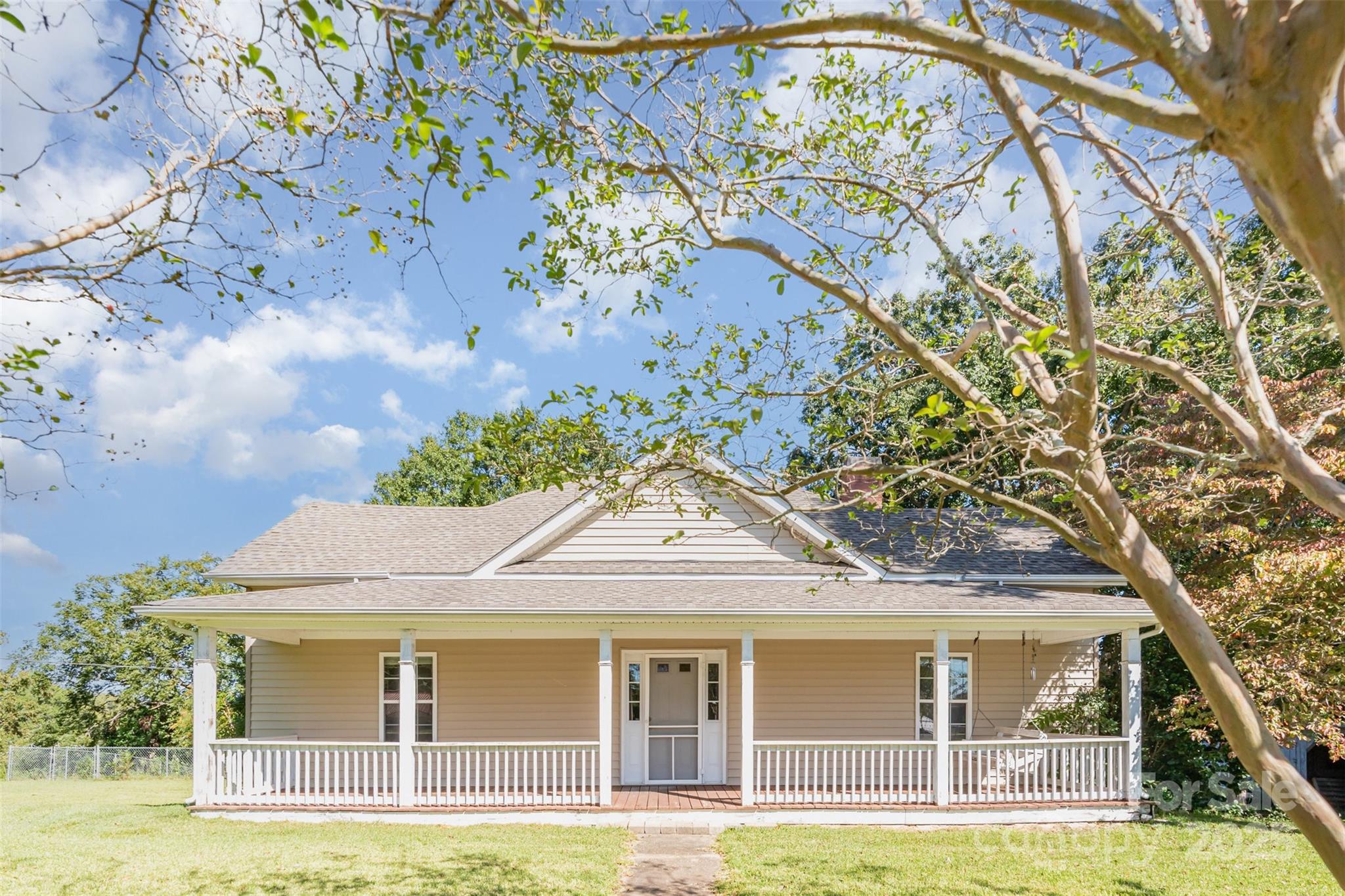 4030 Peachtree Street Hickory Grove, SC 29717 - Photo 2 of 21 a front view of a house with a garden and plants