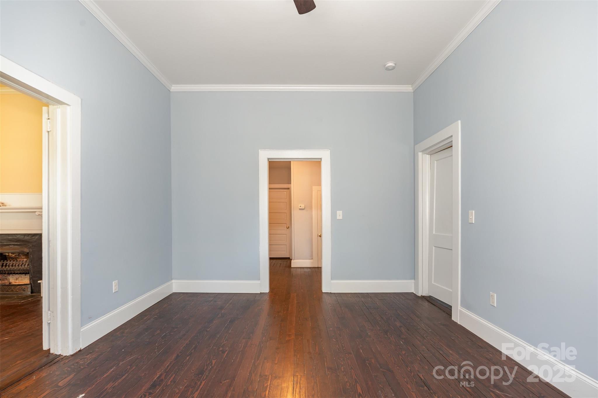 4030 Peachtree Street Hickory Grove, SC 29717 - Photo 5 of 21 an empty room with wooden floor and windows