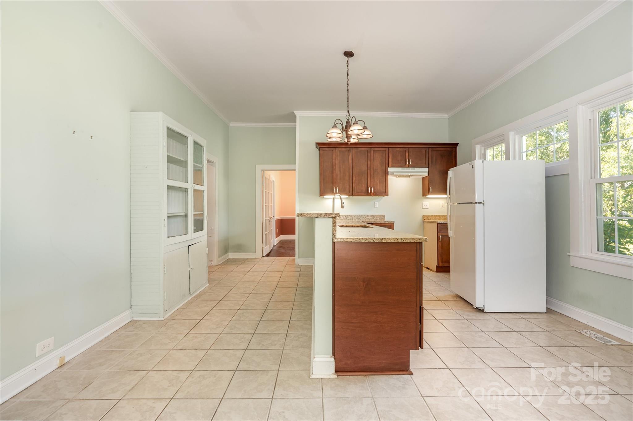 4030 Peachtree Street Hickory Grove, SC 29717 - Photo 8 of 21 a kitchen with refrigerator and window