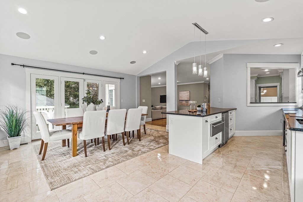 74 Oak Street Wellesley, MA 02482 - Photo 19 of 40 a living room with furniture a dining table and chairs