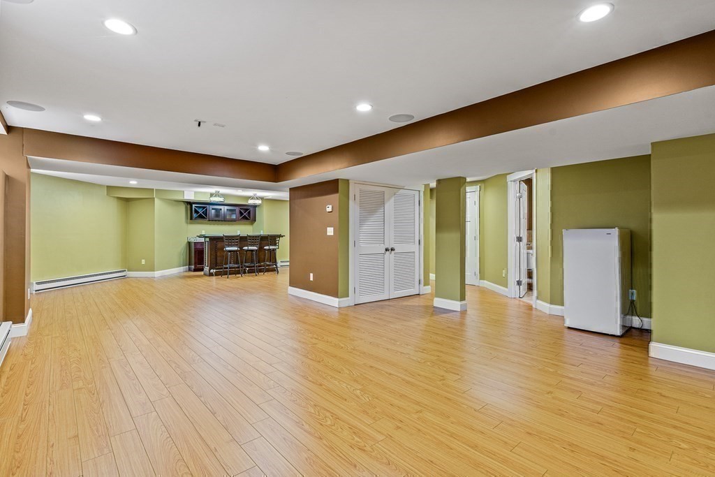 74 Oak Street Wellesley, MA 02482 - Photo 34 of 40 a view of empty room with wooden floor