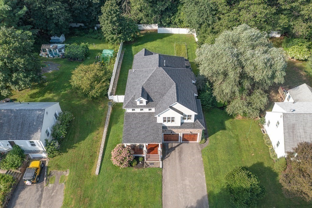 74 Oak Street Wellesley, MA 02482 - Photo 37 of 40 an aerial view of a house with a garden