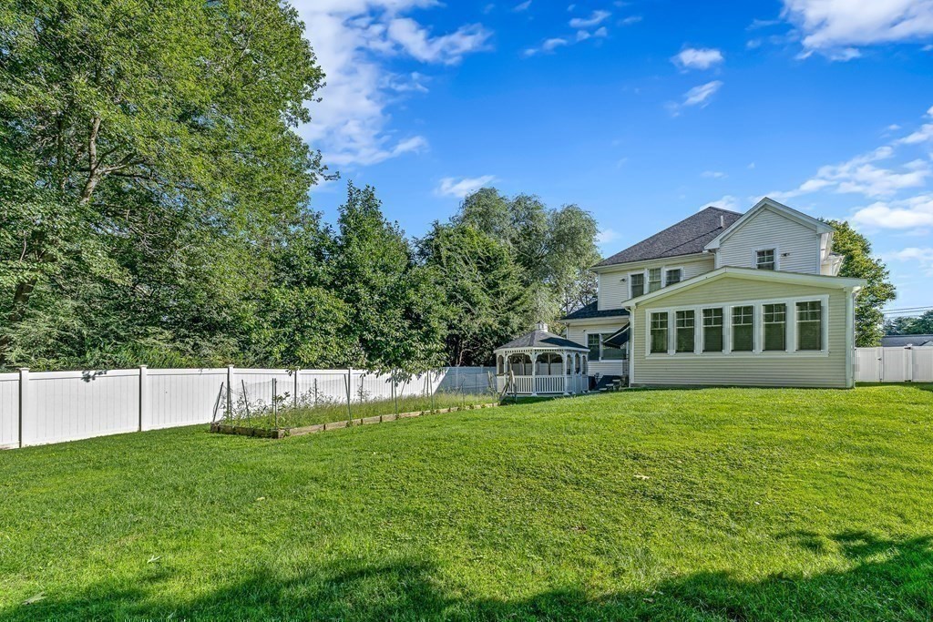 74 Oak Street Wellesley, MA 02482 - Photo 39 of 40 a view of a house with a big yard