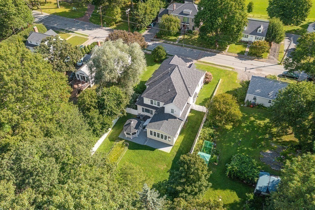 74 Oak Street Wellesley, MA 02482 - Photo 40 of 40 a view of a house with a yard and sitting area