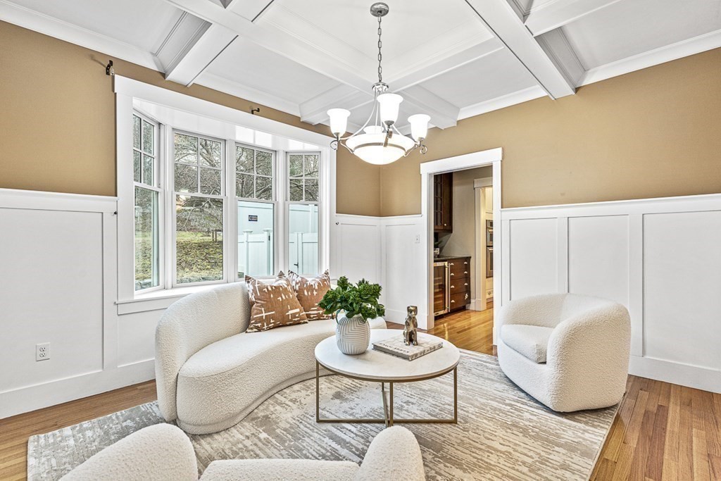 74 Oak Street Wellesley, MA 02482 - Photo 5 of 40 a living room with furniture chandelier and a table