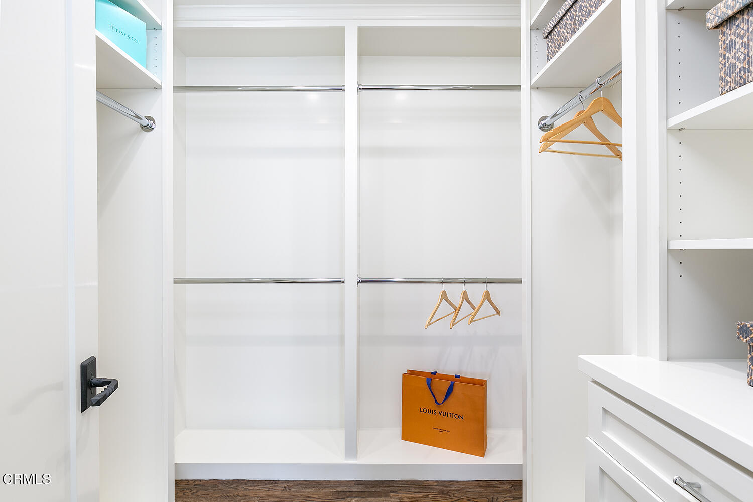 1570 San Pasqual Street Pasadena, CA 91106 - Photo 27 of 72 a view of walk in closet with empty racks