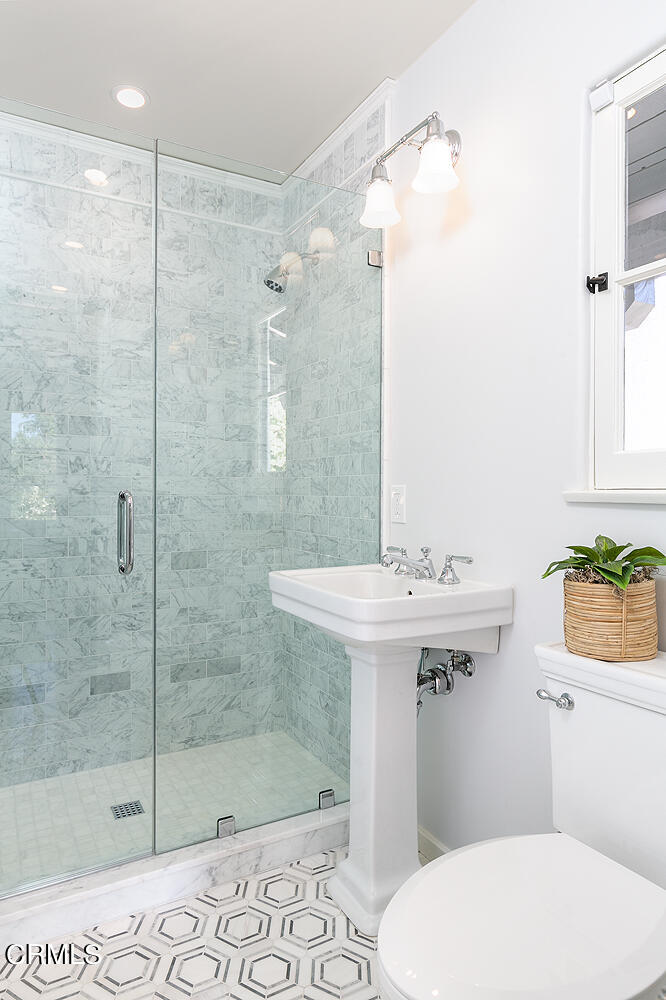 1570 San Pasqual Street Pasadena, CA 91106 - Photo 32 of 72 a bathroom with a sink a toilet and shower
