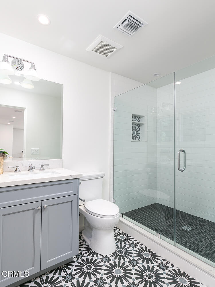 1570 San Pasqual Street Pasadena, CA 91106 - Photo 54 of 72 a bathroom with a sink a toilet and shower