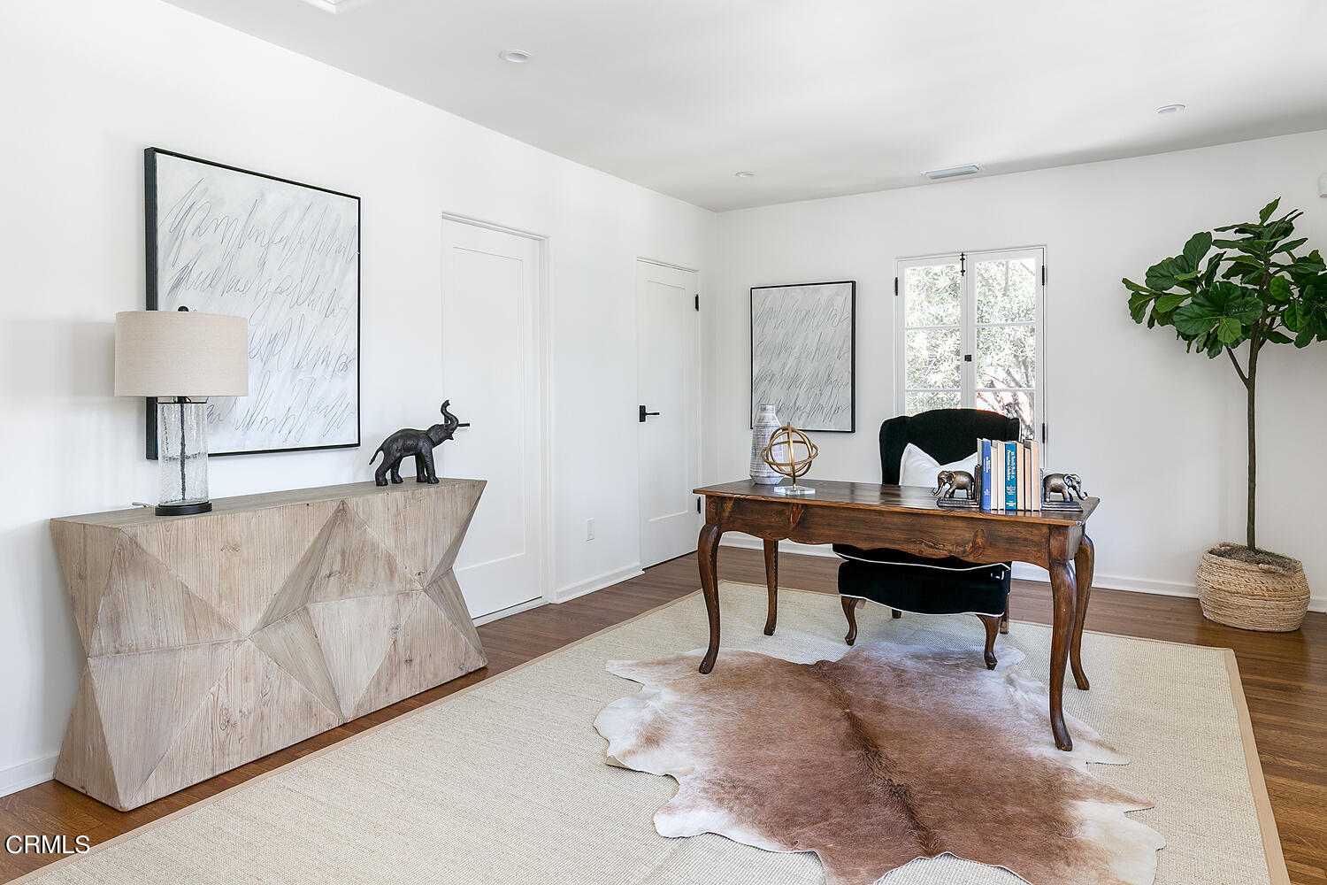 1570 San Pasqual Street Pasadena, CA 91106 - Photo 55 of 72 a living room with furniture and a potted plant