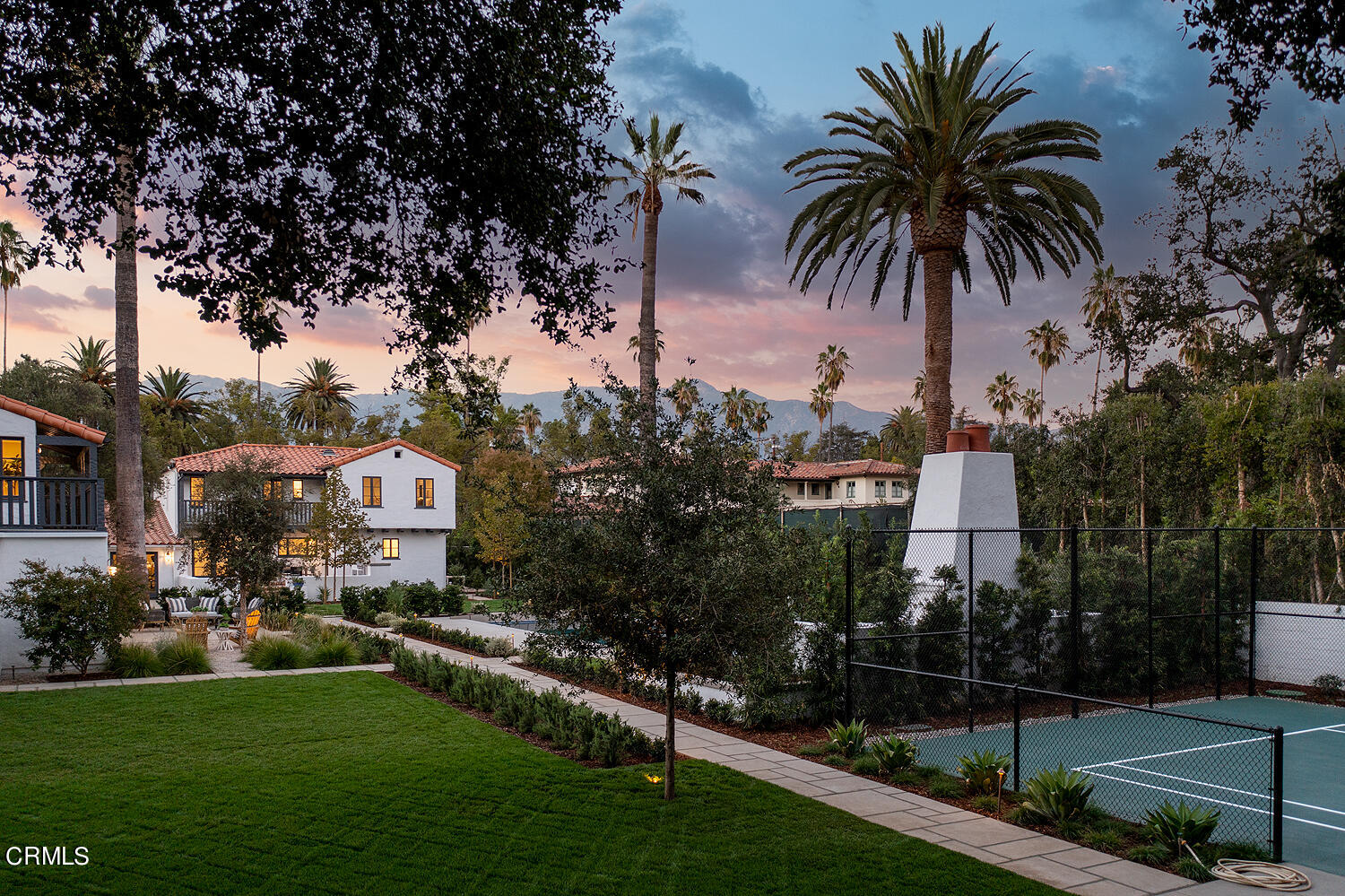 1570 San Pasqual Street Pasadena, CA 91106 - Photo 70 of 72 a front view of a house with a garden and palm tree