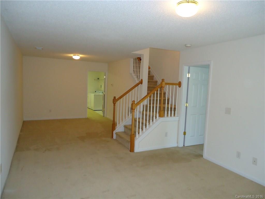 16824 Timber Crossing Road Charlotte, NC 28213 - Photo 16 of 23 a view of a hallway with staircase