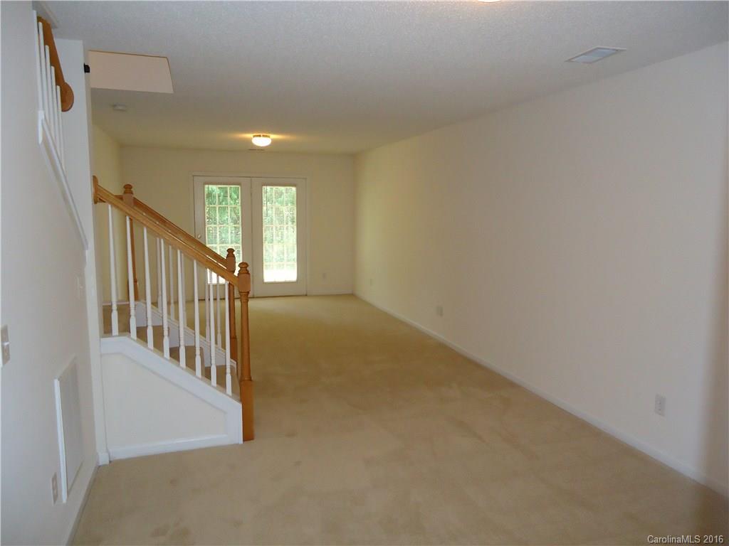 16824 Timber Crossing Road Charlotte, NC 28213 - Photo 17 of 23 a view of a hallway with staircase