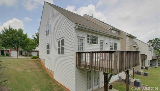 16824 Timber Crossing Road Charlotte, NC 28213 - Photo 23 of 23 a view of a house with backyard and sitting area