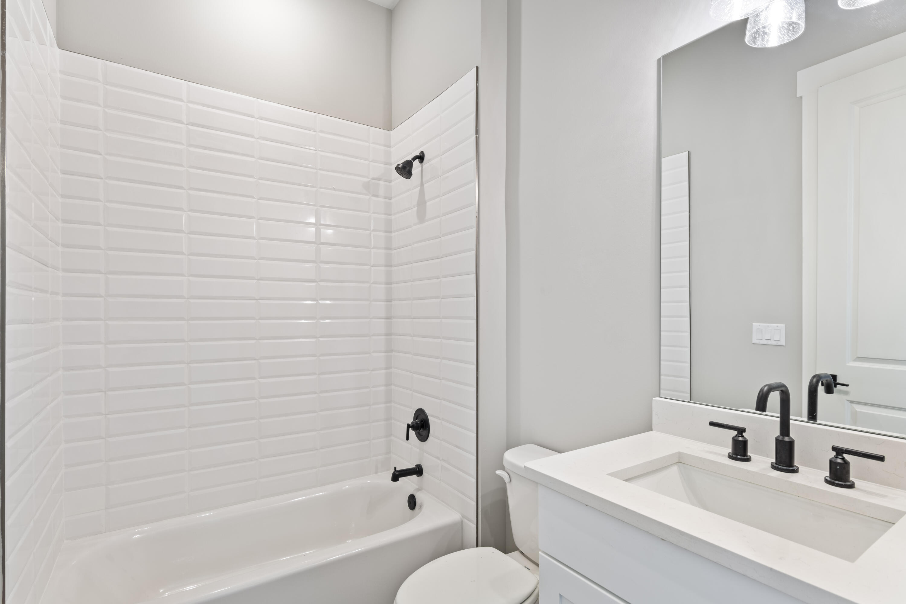 162 Channel Shoal Drive, Unit LOT 2 Santa Rosa Beach, FL 32459 - Photo 19 of 36 a bathroom with a sink toilet and shower
