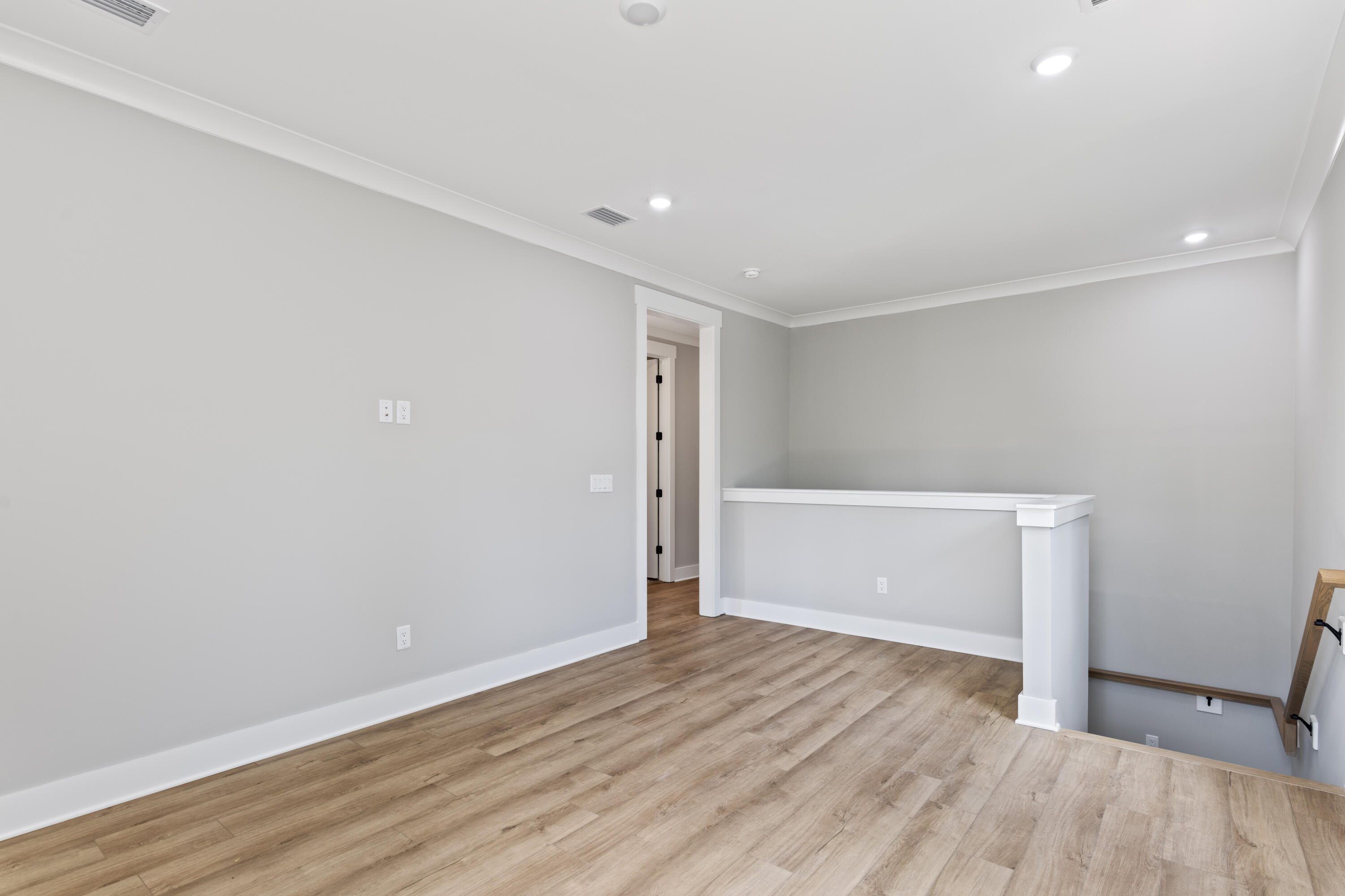 162 Channel Shoal Drive, Unit LOT 2 Santa Rosa Beach, FL 32459 - Photo 21 of 36 a view of empty room with wooden floor