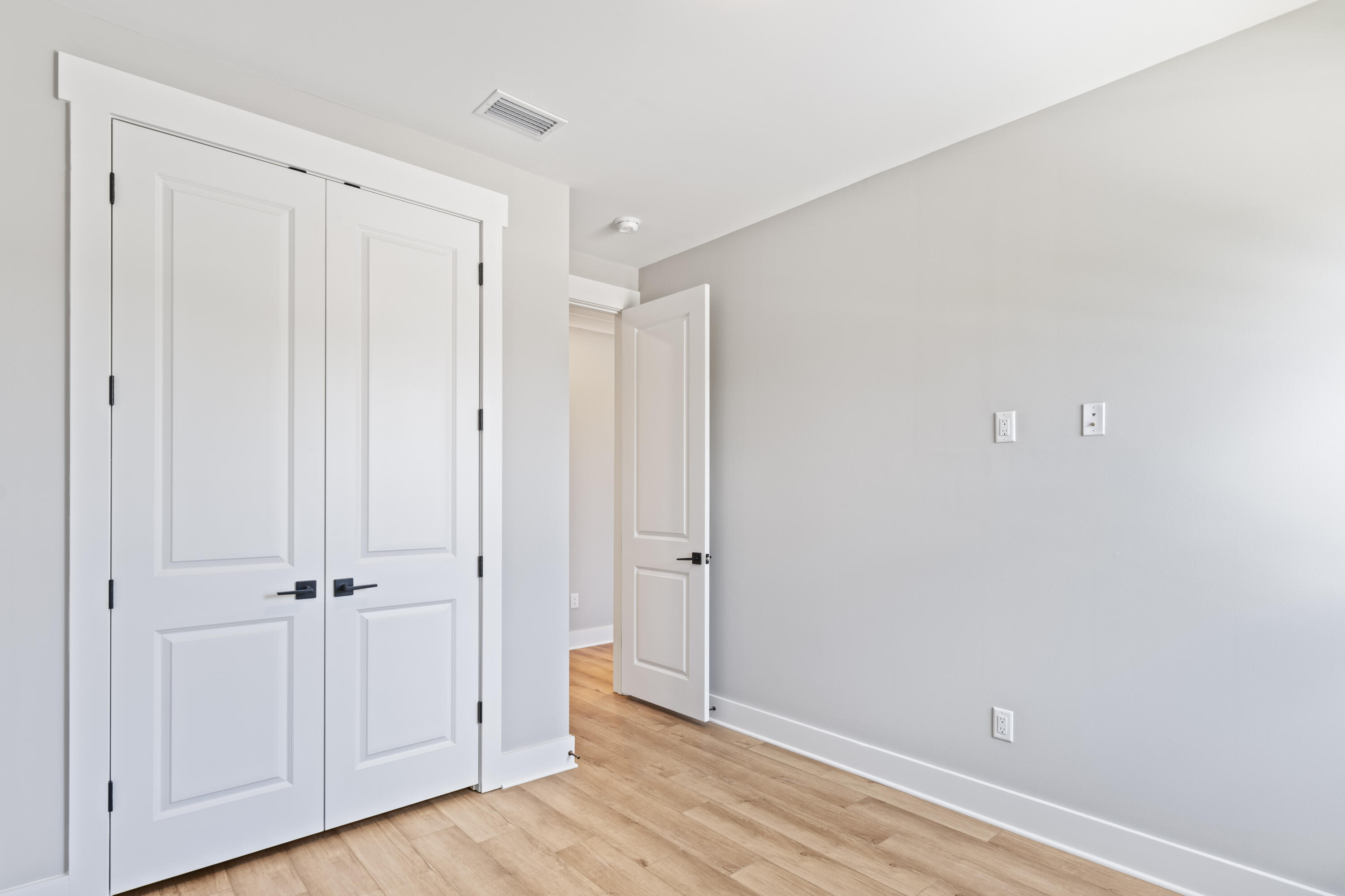 162 Channel Shoal Drive, Unit LOT 2 Santa Rosa Beach, FL 32459 - Photo 27 of 36 an empty room with wooden floor