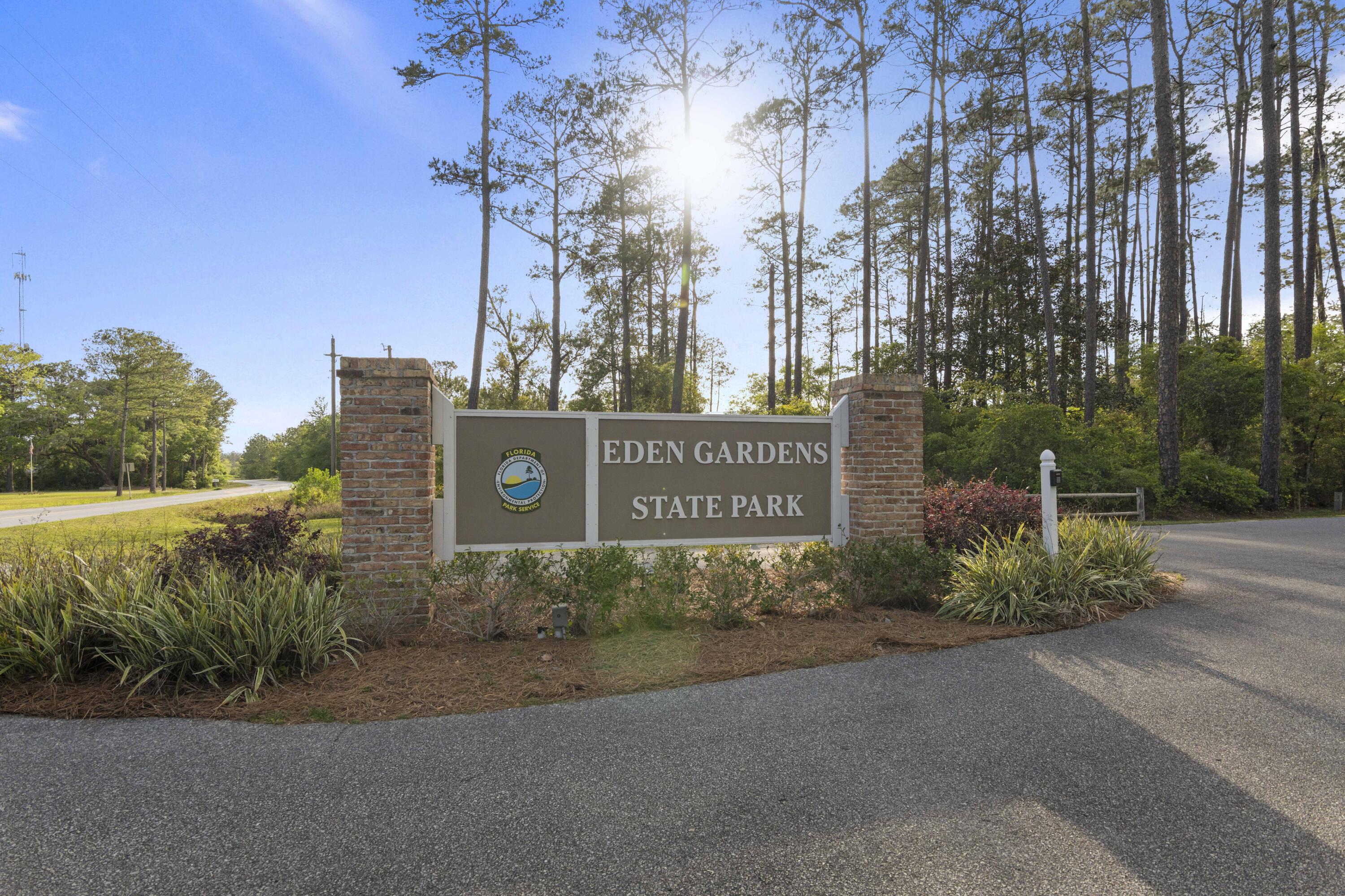 162 Channel Shoal Drive, Unit LOT 2 Santa Rosa Beach, FL 32459 - Photo 36 of 40 a sign that is sitting on a brick wall