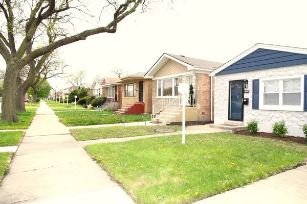 a house with garden in front of it