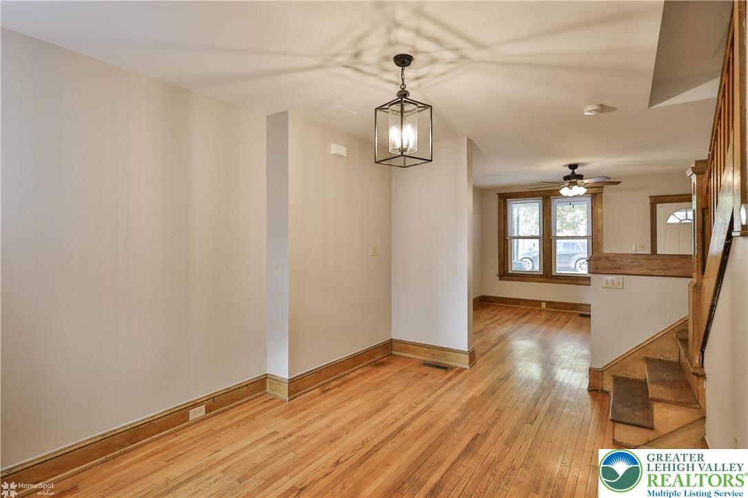 1035 Spring Street Bethlehem, PA 18018 - Photo 11 of 27 wooden floor in an empty room with a window