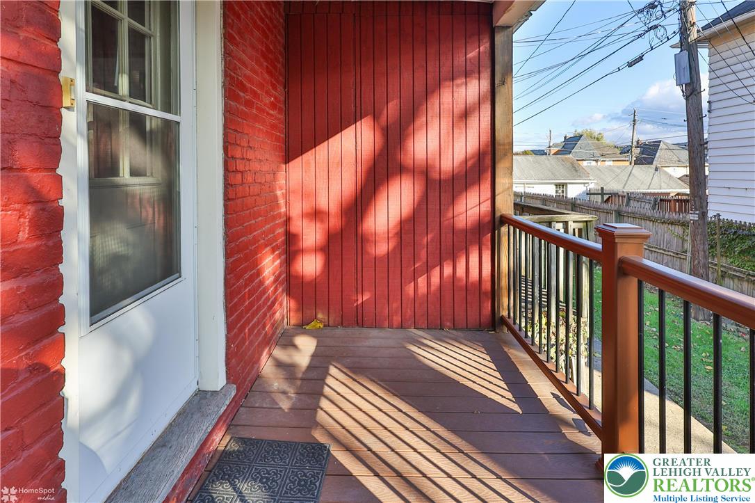 1035 Spring Street Bethlehem, PA 18018 - Photo 27 of 27 a balcony with wooden floor and outdoor space