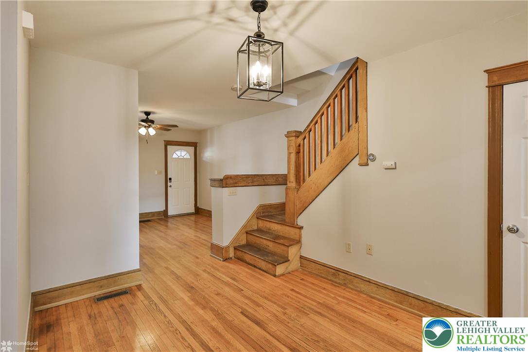 1035 Spring Street Bethlehem, PA 18018 - Photo 9 of 27 a view of entryway and hall with wooden floor