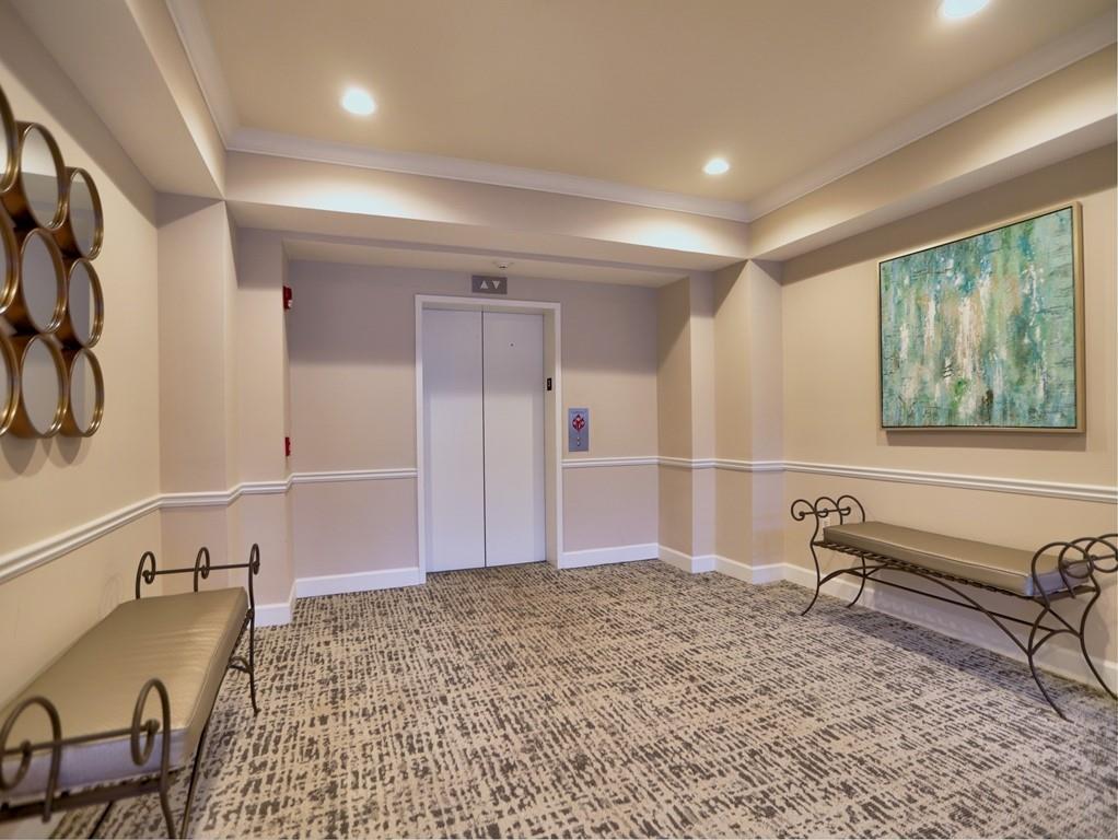3636 Habersham Road Northwest, Unit 2308 Atlanta, GA 30305 - Photo 28 of 42 a view of entryway with wooden floor