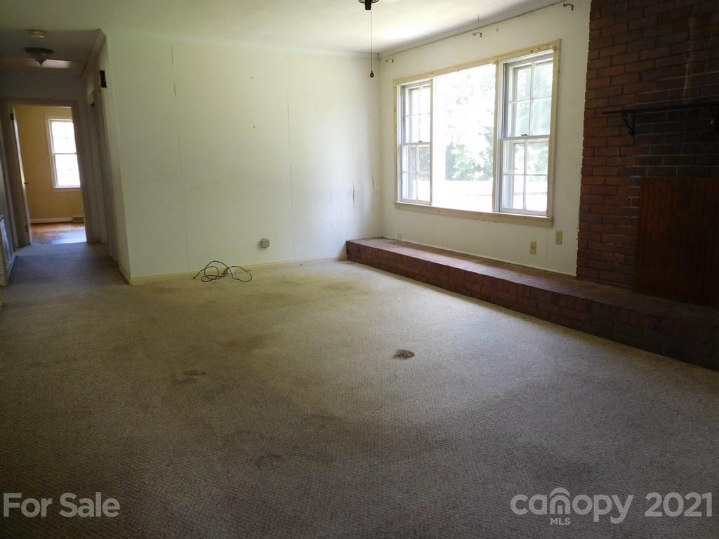 621 Charles Road Shelby, NC 28152 - Photo 7 of 17 a view of an empty room with a window