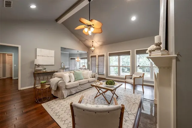 a kitchen with granite countertop a sink and a window