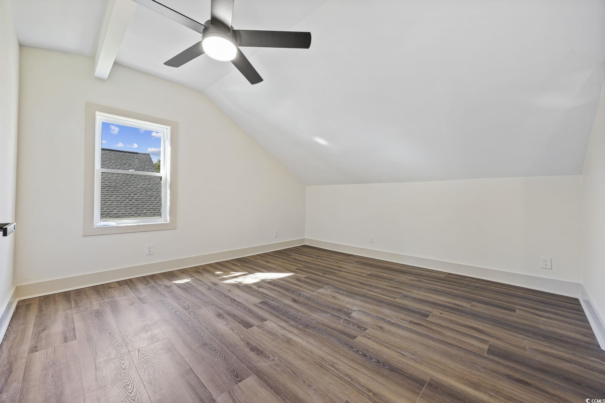 513 Plantation Drive Surfside Beach, SC 29575 - Photo 26 of 44 Bonus room with dark wood-style floors and ceiling fan
