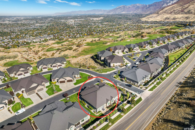 1132 Sunset Dunes Way Draper, UT 84020 - Photo 3 of 35 Well-maintained residential property featuring a gray roof, light-colored exterior siding, and landscaping
