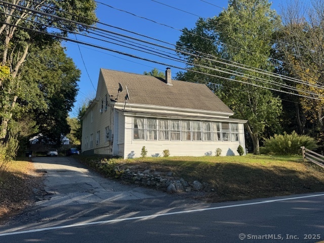 a house view with a swimming pool