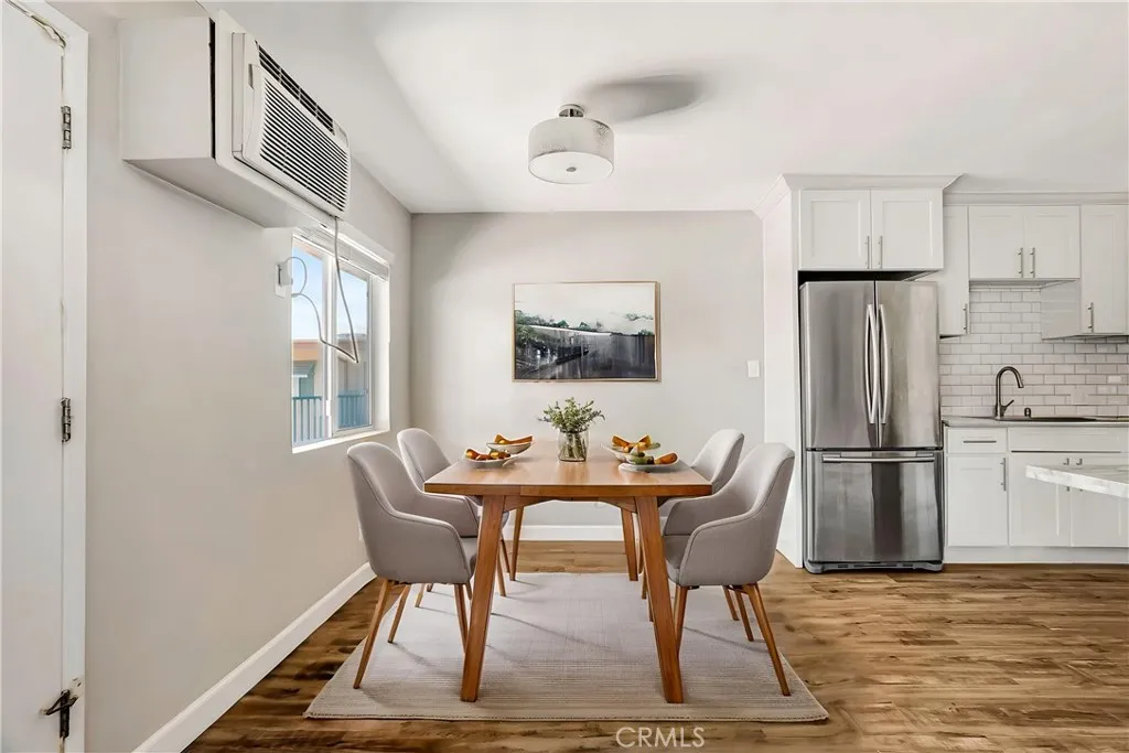 6520 Shirley Reseda, CA 91335 - Photo 15 of 26 a dining room with furniture and a kitchen view