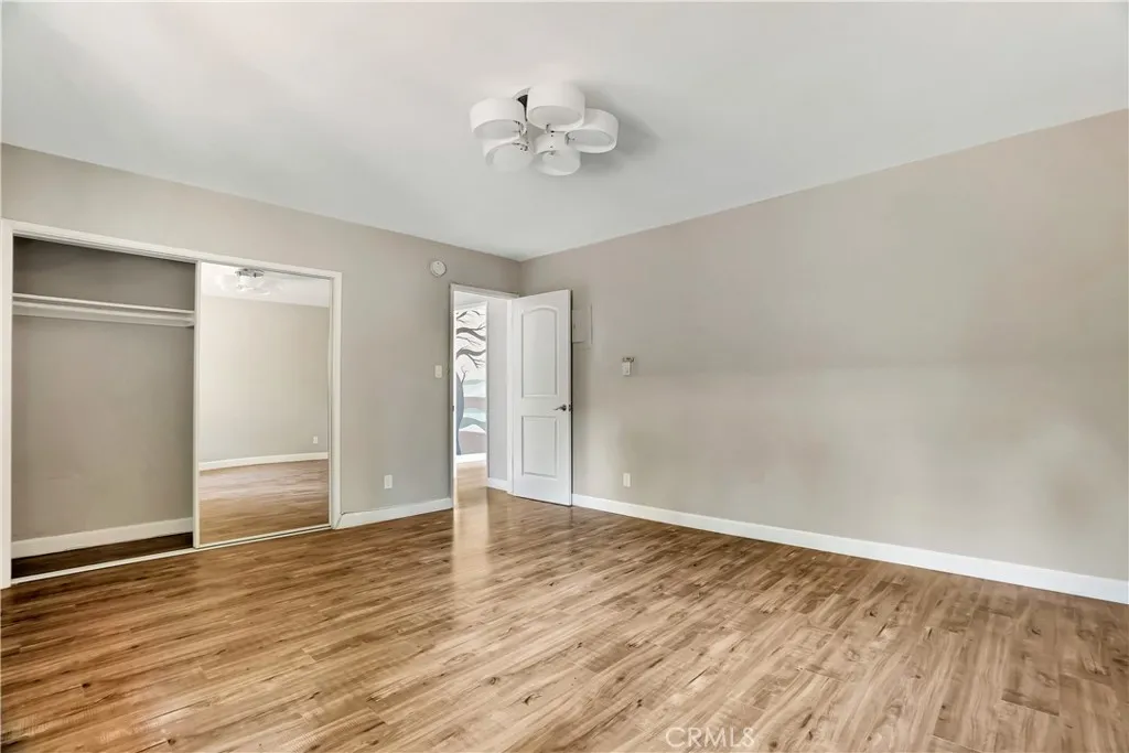 6520 Shirley Reseda, CA 91335 - Photo 19 of 26 a view of an empty room with wooden floor