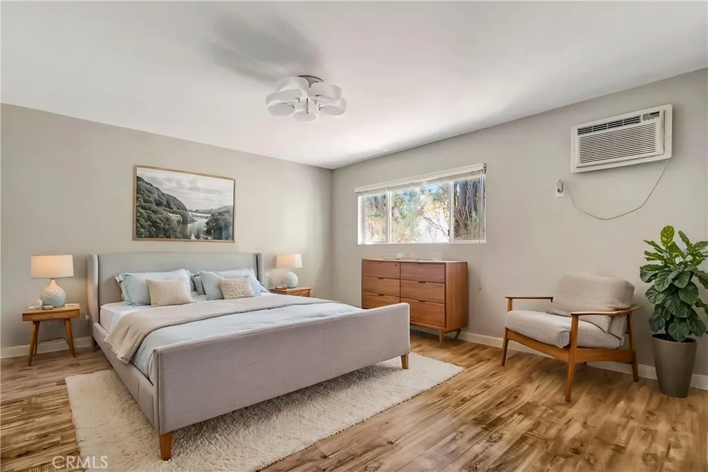 6520 Shirley Reseda, CA 91335 - Photo 3 of 26 a bedroom with a large bed and a couch